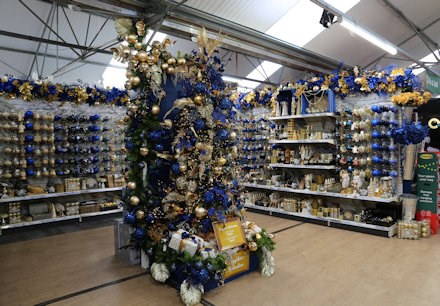 Blue and gold themed Christmas decoration display at Longacres Bagshot