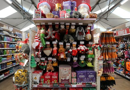 Christmas themed dog items including treats and toys at Longacres Bagshot