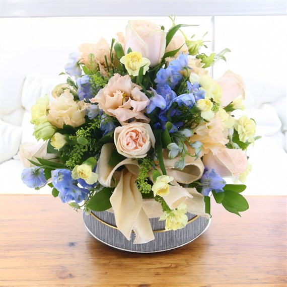 Pastel Blue and Peach Hat Box Floral Arrangement